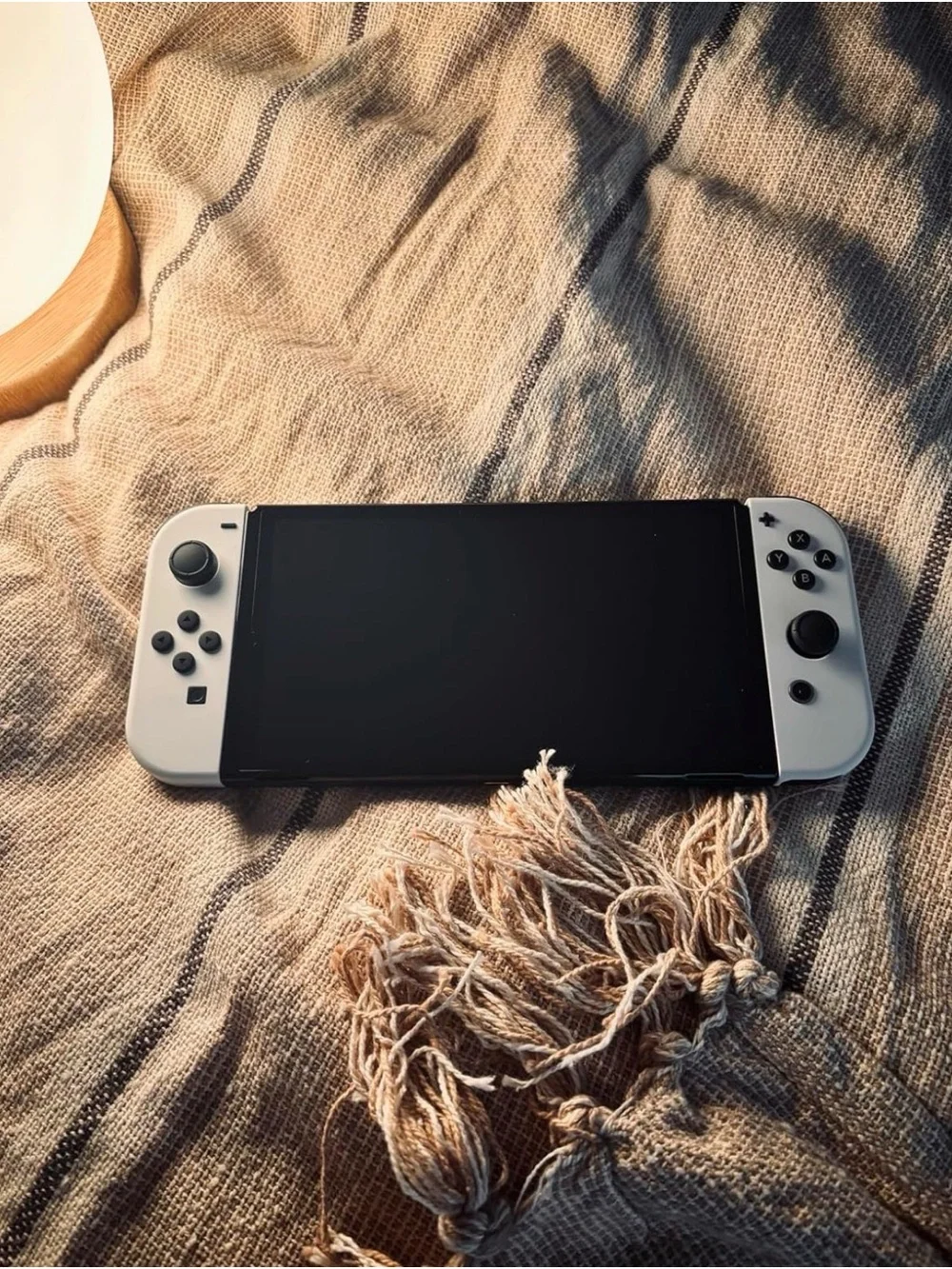 Nintendo OLED Console with White and Black Joy‑Con